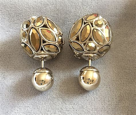 dior tribal style earrings